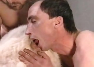 Mature blonde in a zoophile orgy